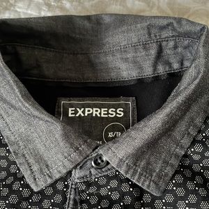 Black men’s short sleeved, Express brand polo shirt. Size XS